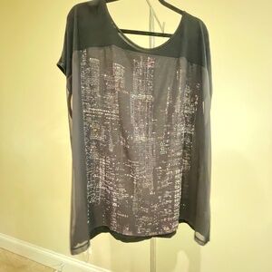 Lane Bryant top, size 22/24, black with city scape impression on front.